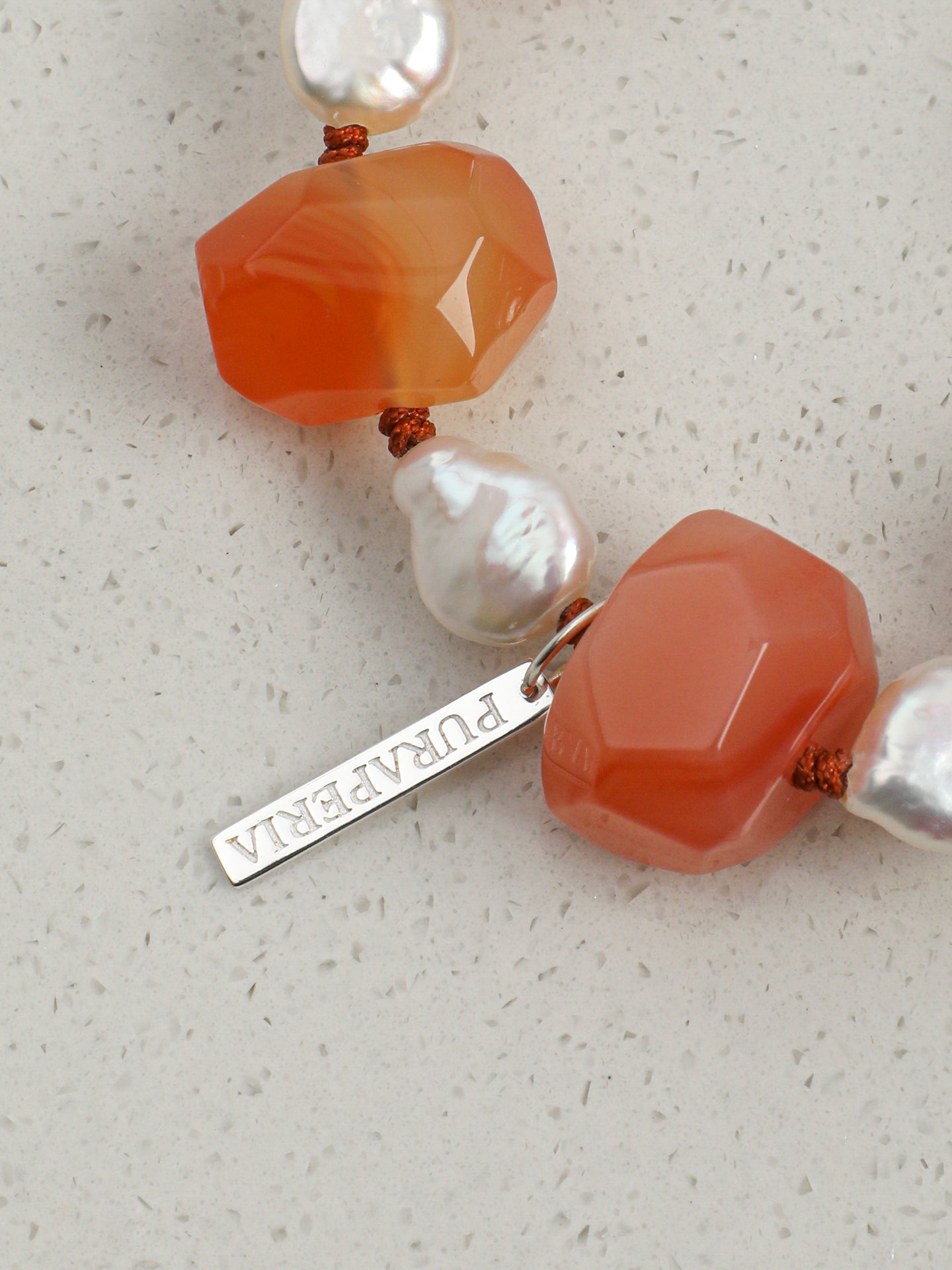 Amethyst crystal pendant with blush silk pouch