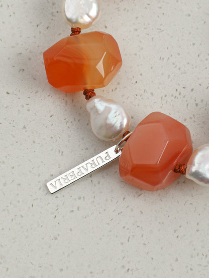 Amethyst crystal pendant with blush silk pouch